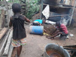 Teenagers processing palm oil