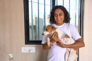 Founder Ujwala with amputated puppy
