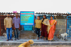 Veterinarian, manager, her mom and staff