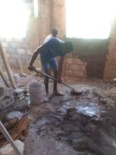 Cleaning up debris to begin rebuild