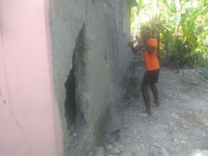 Beginning bringing down remaining walls