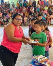 Receiving School Supplies From PERENCO & EIG SA