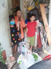 Three kids of Mrs. N were receiving the food