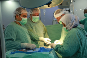 Conducting Surgical operation at Al Awda hospital