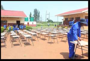 Image 2: Apprentices assembling desks