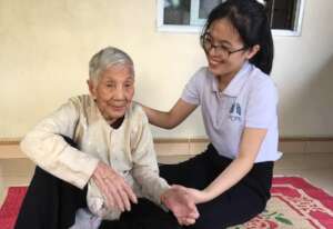 Staff supporting a 90-year old beneficiary