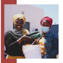 Two ladies happy to receive their bucket