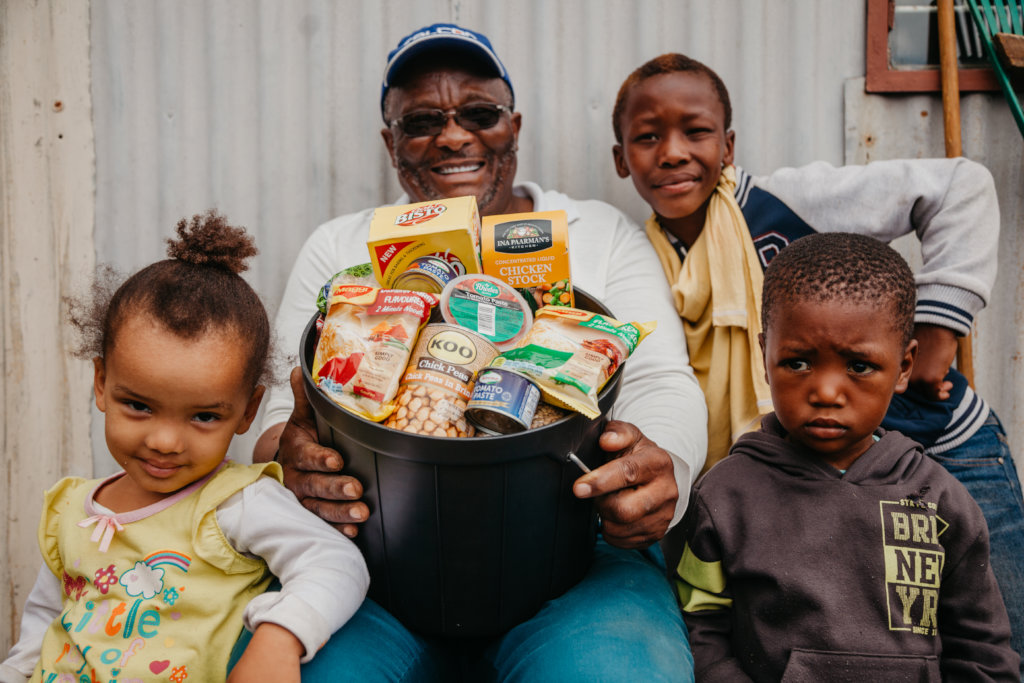 Provide grocery parcels to hungry African families