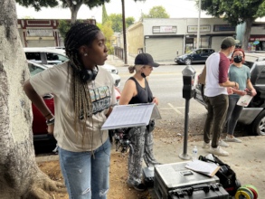 Alix on the set for El Paisa