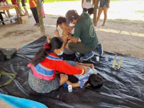 Ancestral Shipibo healers attending patients