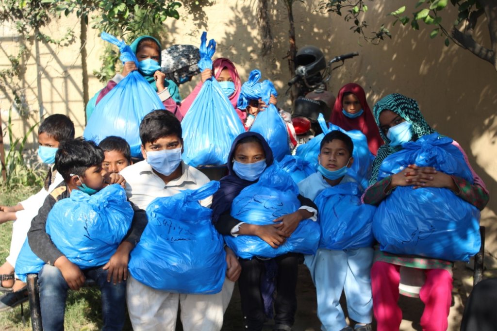 Provide 100 Homeless Children with Warm Clothes