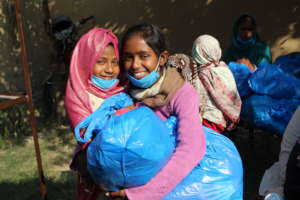 children happy to  warm clothes