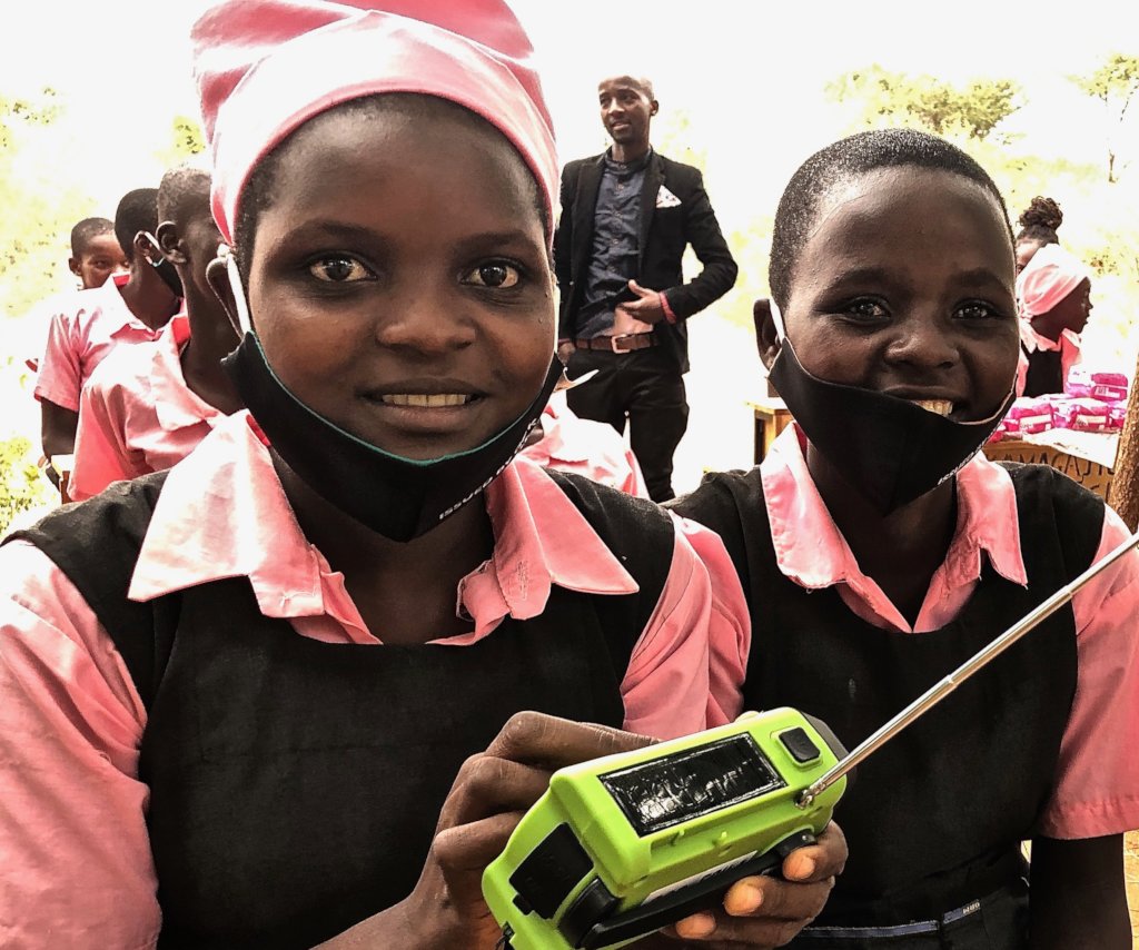 Meru girls receiving Fenix radios