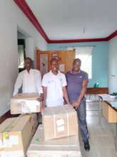 Staff at Unyama receiving an Ultrasound machine