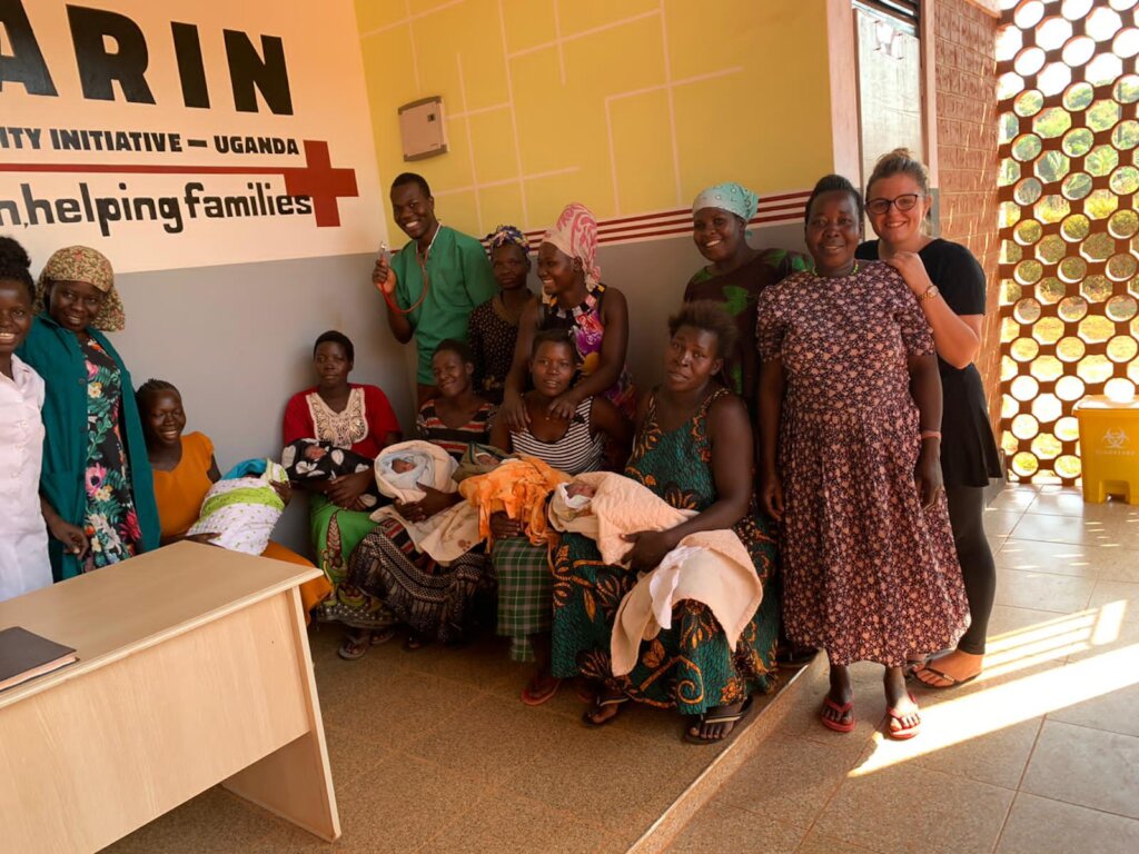 Agonga staff jubilating with newborns