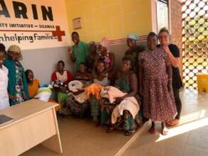 Agonga staff jubilating with newborns