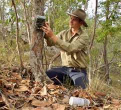 AWC placing camera trap