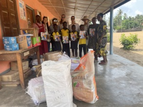 Volunteers handing out books