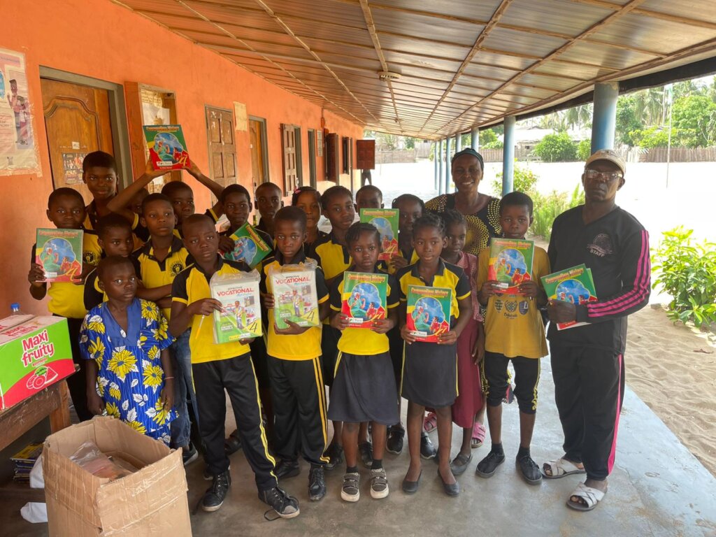 Happy pupils with the books they got