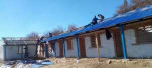Fixing roof at Shyambu School