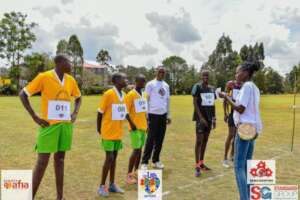 a volunteer coordinating runners