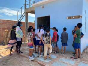 Students are learning to use toilet facilities.