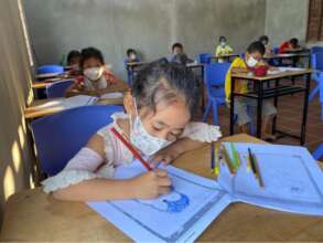 Youngest students are learning to draw.