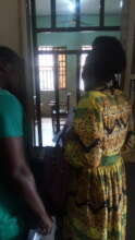 Our beneficiary discussing with a hospital staff