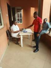Our Project Leader paying for the hospital bill