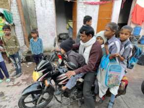 Meanwhile, a dad taking kids to school...