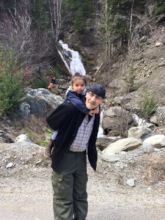 Lester with his grandchild.