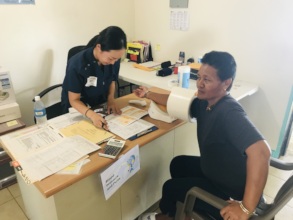Angaur, Palau resident receiving health screening