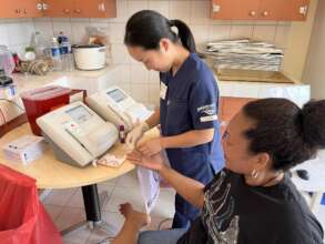 Community member receives blood screening