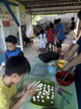 Children make mochi at PW cooking event (2024)