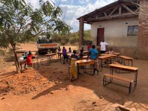 Students receiving desks at Mkanthama school