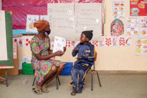 A mother practices communication with her child