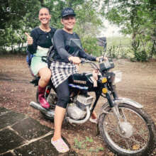 Two swimming teachers on the bike