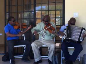 Trio of blind musicians creating beautiful music