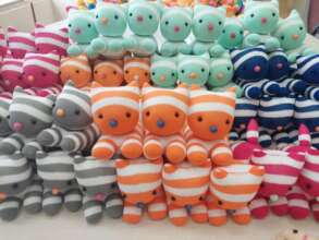 Cat dolls made by burn survivors