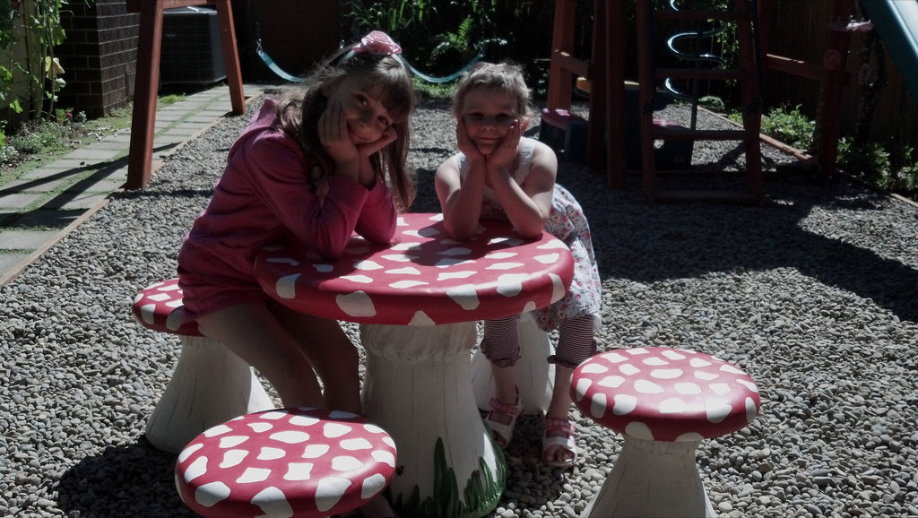 Adeline and Her Sister at the Toadstool Tea Table