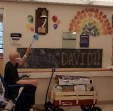 David ringing the bell for the end of his chemo