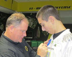 Ducks coach Chip Kelly autographs Jack's jersey