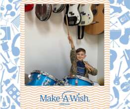 Uriah with his drum set in his House of Rock