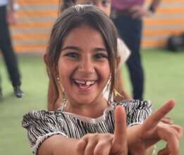 ...And a very happy girl at the Hope Buses
