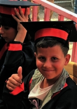 One of the first graduates of the Hope Buses
