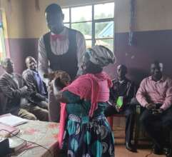 The grandmother of a graduate presents a gift