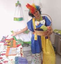 A helper in costume demonstrates products