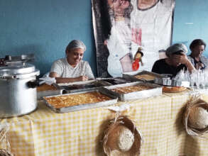 Serving traditional treats at the July festival