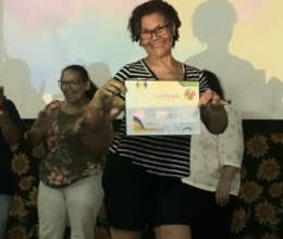 Selma with her certificate