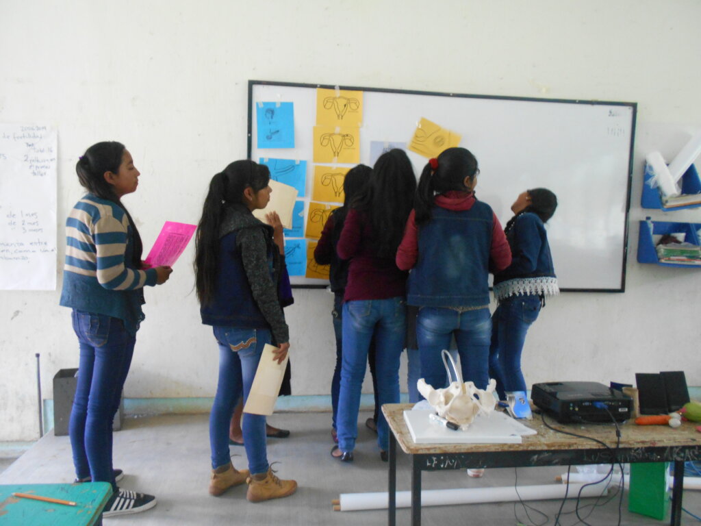 Girls participate in a workshop